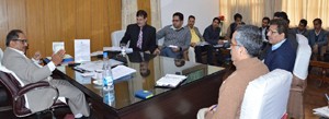 Deputy Chief Minister, Dr Nirmal Singh chairing a meeting at Jammu on Thursday.