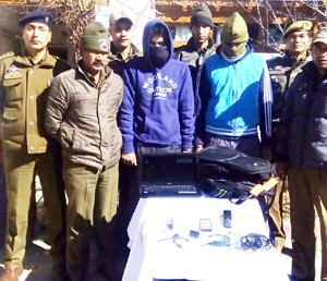 Members of inter-state ATM cloning gang  in Leh Police custody.— Excelsior/Stenzin
