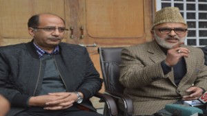 National Conference General Secretary Ali Mohammad Sagar and provincial president Nasir Aslam Wani addressing a press conference at Party headquarters in Srinagar on Wednesday. -Excelsior/Amin War