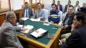 Chief Secretary, B R Sharma chairing meeting at Jammu on Monday.