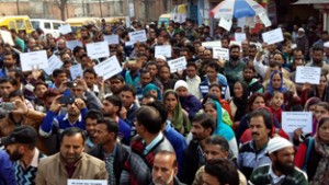 ReT teachers taking out protest rally at Rajouri on Saturday.  -Excelsior/Bhat