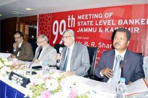 Chairman JK Bank, Mushtaq Ahmed addressing 99th State Level Bankers’ meet in Srinagar on Monday. 