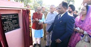DyCM Dr Nirmal Singh laying foundation stone of Model Middle School at Karan Wara on Friday.