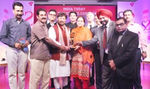 Health & Medical Education Minister Choudhary Lal Singh getting No. 1 healthcare award for J&K from India Today Group in New Delhi on Friday.