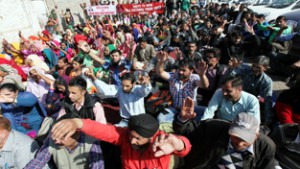 Casual labours and Anganwadi workers staging protest dharna outside Divisional Commissioner’s office in Jammu  on Tuesday. -Excelsior/ Rakesh