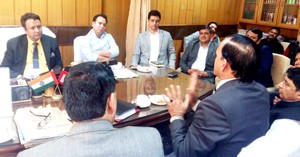 Minister for CAPD, Choudhary Zulfkar Ali chairing a meeting of legislators from erstwhile Doda district at Jammu on Friday.