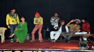 A scene from Hindi play ‘Shooting’ staged on the final day of week-long Theatre Festival at Reasi.