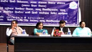 Principal Commissioner Income Tax Sangeeta Gupta and others on dais during valedictory function of Hindi writers camp at JU on Wednesday.
