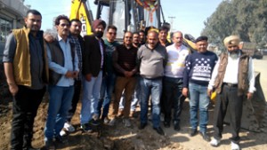 Members of Association of Industries at the site of work launched for construction of road.