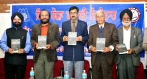 Dignitaries releasing the book ‘Soolan Da Saalan’ during a seminar at K L Saigal Hall, Jammu.