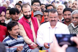 Industries Minister Chander Prakash Ganga and HoD Cardiology Dr Sushil Sharma inaugurating health check up camp at Smailpur on Sunday.