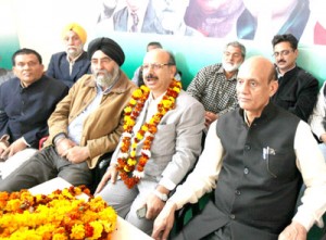 Newly re-elected State unit INTUC president Shiv Kumar Sharma, flanked by All India INTUC Secy, Dr Subash Sharma at PCC office in Jammu on Sunday. -Excelsior/ Rakesh