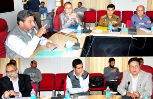 Minister for R&B, Syed Mohammad Altaf Bukhari chairing a meeting at Jammu on Friday.