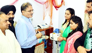 Speaker Legislative Assembly, Kavinder Gupta interacting with management after inaugurating private physiotherapy clinic at Gandhi Nagar on Thursday.