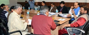 Minister for Health, Ch Lal Singh chairing a meeting at Jammu on Friday.