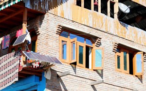 Solar plates attached to houses in Glass Daji village of Kupwara district.-Excelsior/Aabid Nabi