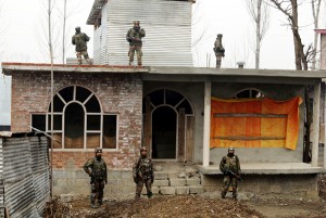 Troops during searches at Ajas, Bandipora on Friday. — Excelsior/Aabid Nabi