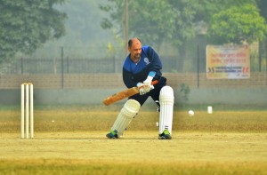 Batsman executing a drive during a match of T20 Tournament organized by POWERGRID.