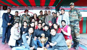 Winners of Bhaderwah Campus posing for a group photograph after lifting title trophy on Tuesday.