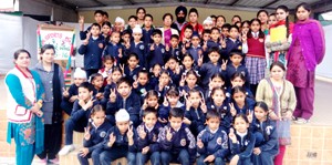 Winners of Inter-House Sports Competition posing for a group photograph at Kartar Public School on Monday.