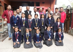 Medal winners of Table Soccer Championship posing for a group photograph on Wednesday.