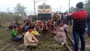 People protesting at Govindsar Railway track on Monday.  -Excelsior/Madan