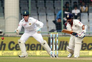 Ajinkya Rahane of India plays a shot during Day One of the fourth Test against South Africa in New Delhi.