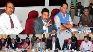Minister for R&B, Syed Mohammad Altaf Bukhari chairing a meeting at Jammu on Thursday.