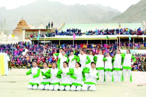 Students and others performing during Republic Day celebrations at Leh.— Excelsior/Stanzin