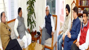 BJP delegation during a meeting with Governor N N Vohra at Raj Bhawan on Friday.