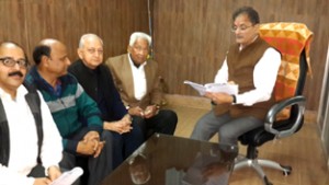 Speaker, Legislative Assembly, Kavinder Gupta during a meeting with DDA deputation at his official residence in Jammu.