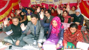 KGBV teachers sitting on hunger strike at Press Club in Jammu on Friday.