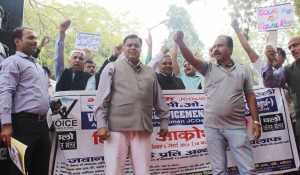 Activists of  All India Ex-Servicemen shouting slogans in favour of their various demands at Jantar Mantar in New Delhi on Sunday. (UNI)