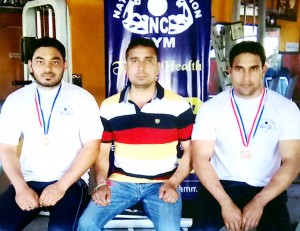 Gold medal winners posing along with their coach Sanjev Singh Rakwal.