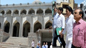 Minister for Hajj, Syed Farooq Ahmad Andrabi inspecting ongoing work of Jamia Masjid at Talab Khatikan on Saturday.