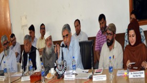 Minister for Agriculture Ghulam Nabi Lone Hanjura chairing a meeting in Poonch on Saturday.