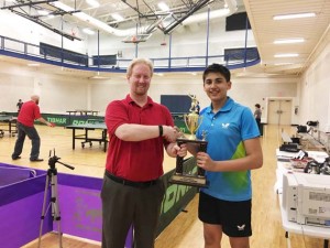 Aryan Mahajan showing trophy, which he won in 2016 Cincinnati Open at Ohio.