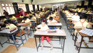 Students during 6th J&K State Level UCMAS Abacus & Arithmetic Completition at Mahajan Hall, Jammu on Sunday.