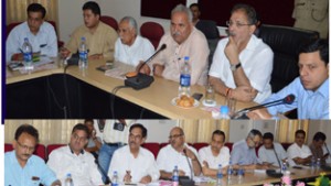 Minister for PHE, Sham Lal Chaudhary and Speaker Legislative Assembly Kavinder Gupta chairing a meeting at Jammu on Saturday.