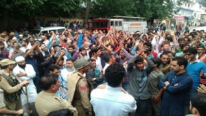 People protesting at Doda on Monday.—Excelsior/Tilak Raj