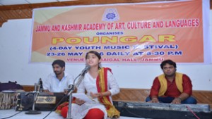 A singer performing during the inaugural day of 4-day music festival ‘Poungar’.