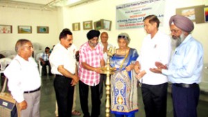 Prof Rita Jitendra, former secretary JKAACL and others jointly inaugurating art workshop in Jammu on Thursday.