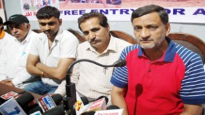 Shiv Kumar Sharma interacting with media persons at Jammu on Friday. -Excelsior/Rakesh