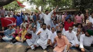 NC activists protesting against power crisis in Jammu on Thursday. -Excelsior/Rakesh