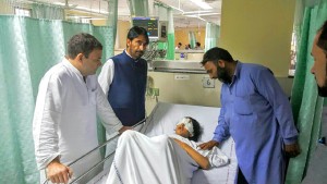 AICC vice president Rahul Gandhi along with PCC chief GA Mir inquiring about an injured child at AIIMS on Wednesday. 