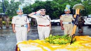 IG CRPF Kuldeep Dhar paying tributes to martyrs of Force at Group Centre Bantalab on Wednesday.