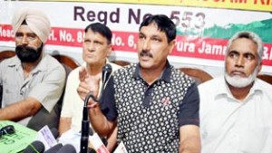 Ex-Central Paramilitary Forces personnel addressing a press conference in Jammu on Tuesday.        -Excelsior/Rakesh