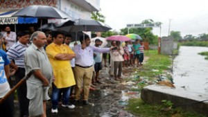 MLA R S Pura Gagan Bhagat during his visit to water logged areas of R S Pura on Wednesday.