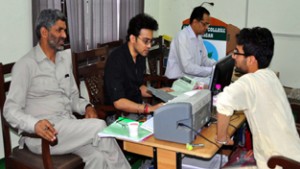 A student being provided counseling under PMSSS at Amar Singh College in Srinagar.