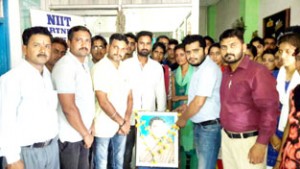 PYC leaders and workers paying tributes to Rajiv Gandhi.